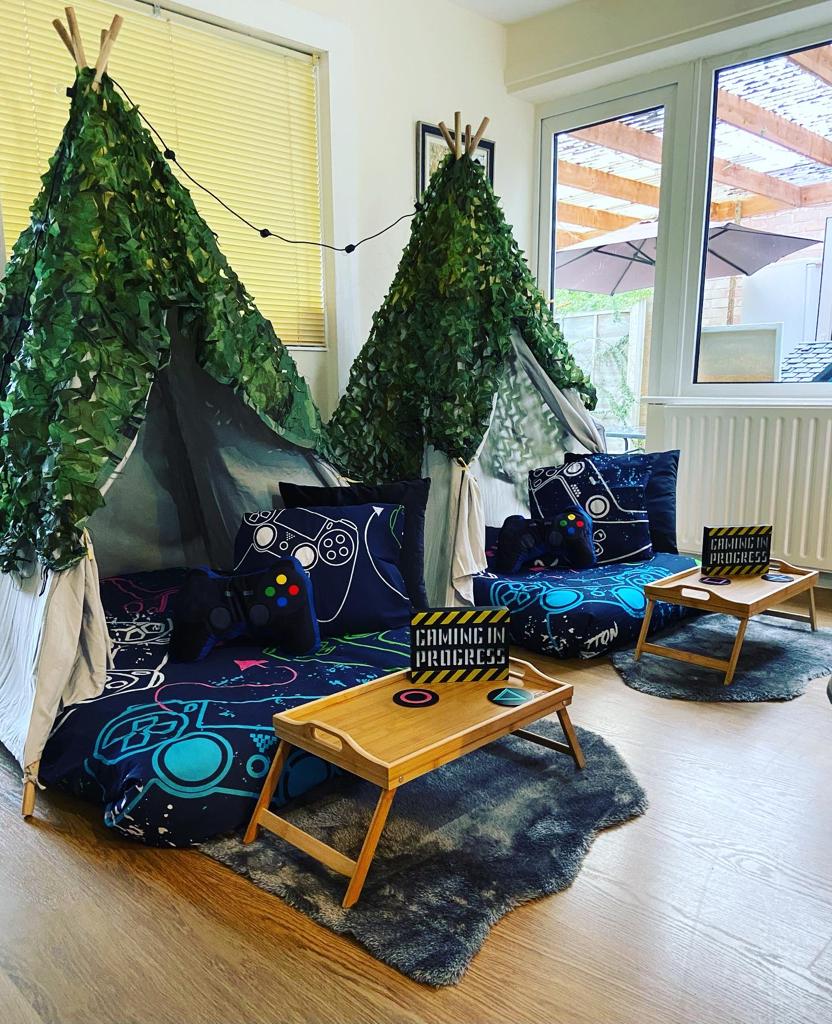 Camo gaming themed teepees set up for a children's sleepover party