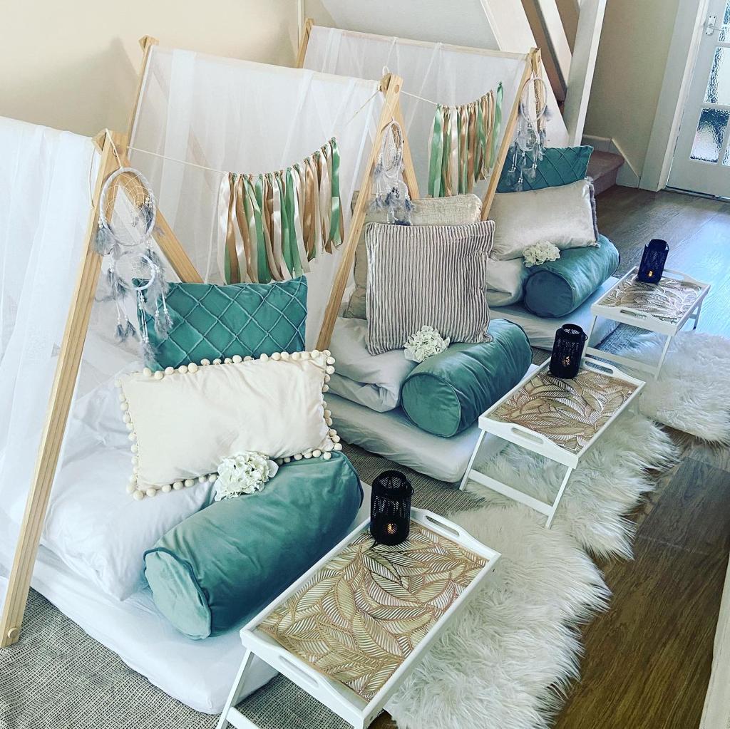 Teal boho teepees styled with dreamcatchers for a children's sleepover party