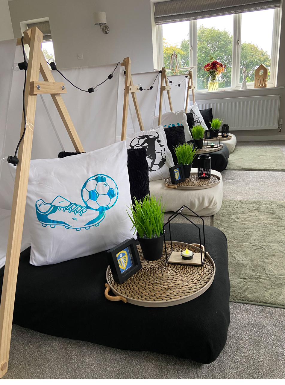 Football themed teepee sleepover party setup